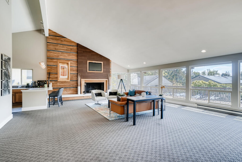 Clubhouse lounge with fireplace at Park 120 apartments for rent in Snohomish County