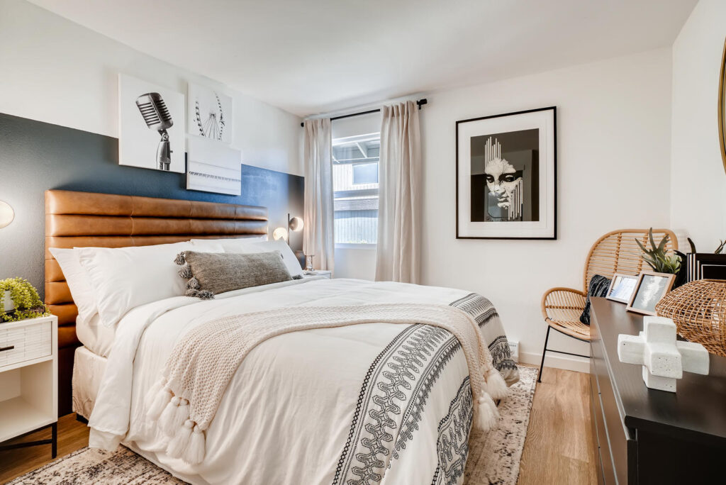 Bedroom with dark gray accent wall in our apartments in Everett, WA.