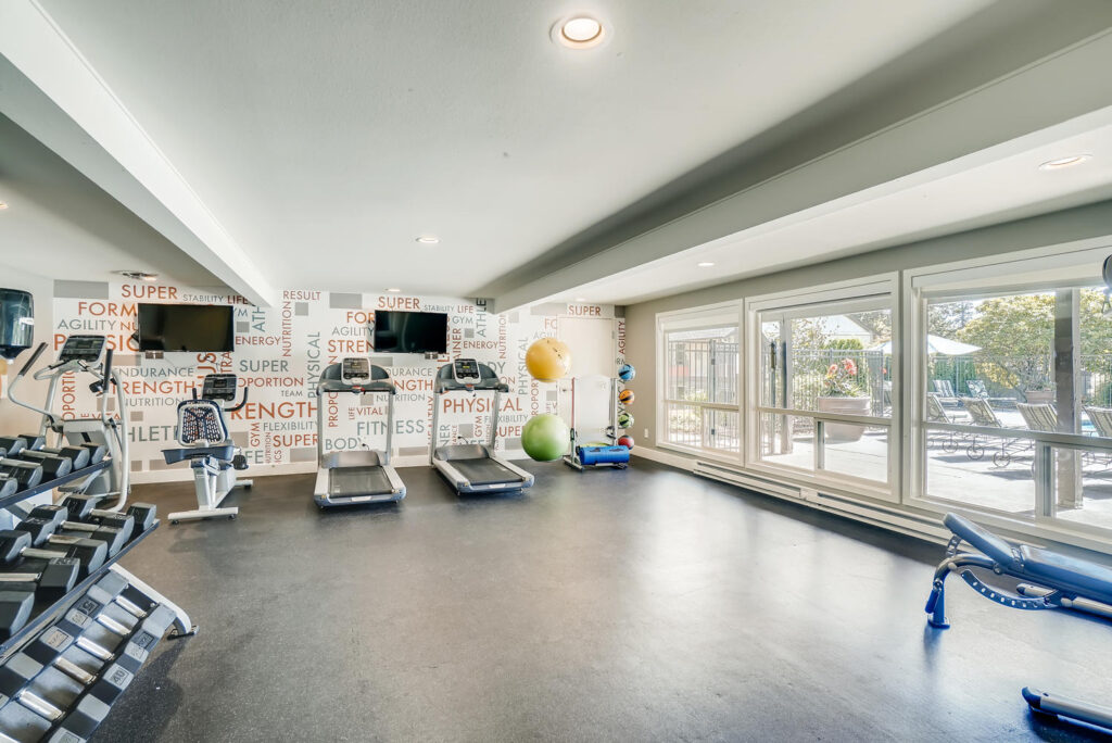 Fitness center with free weights in our apartments for rent in Everett.